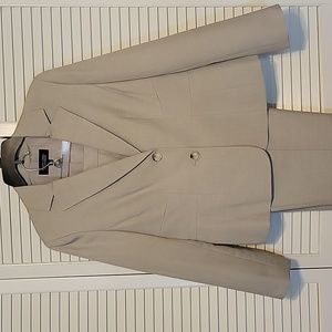 Beige lined jacket with matching lined trousers.  Size 12.